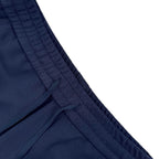 Close-up of navy waistband and drawstring with stitched panel detailing
