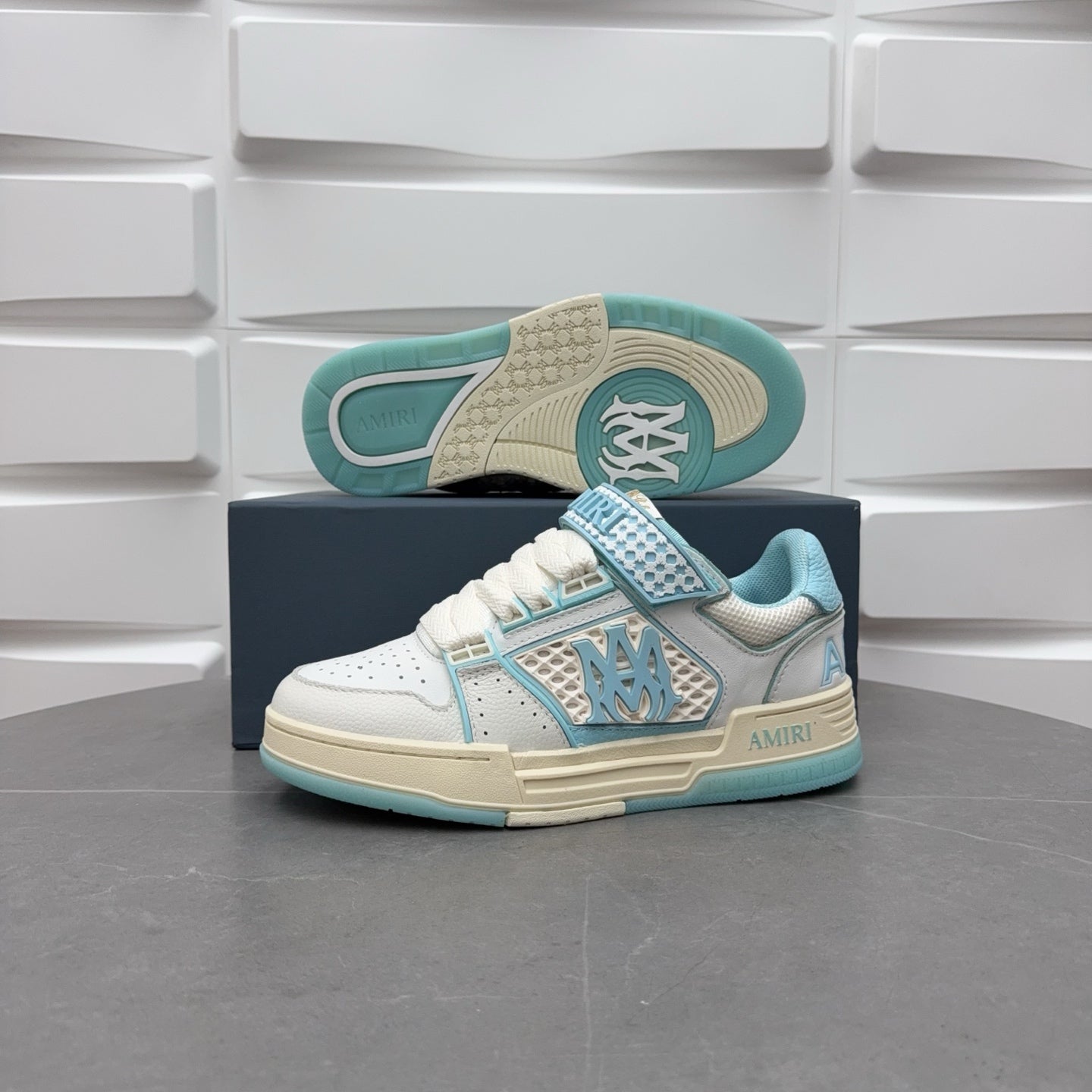 Amiri low-top sneakers, white with light blue accents and visible tread outsole