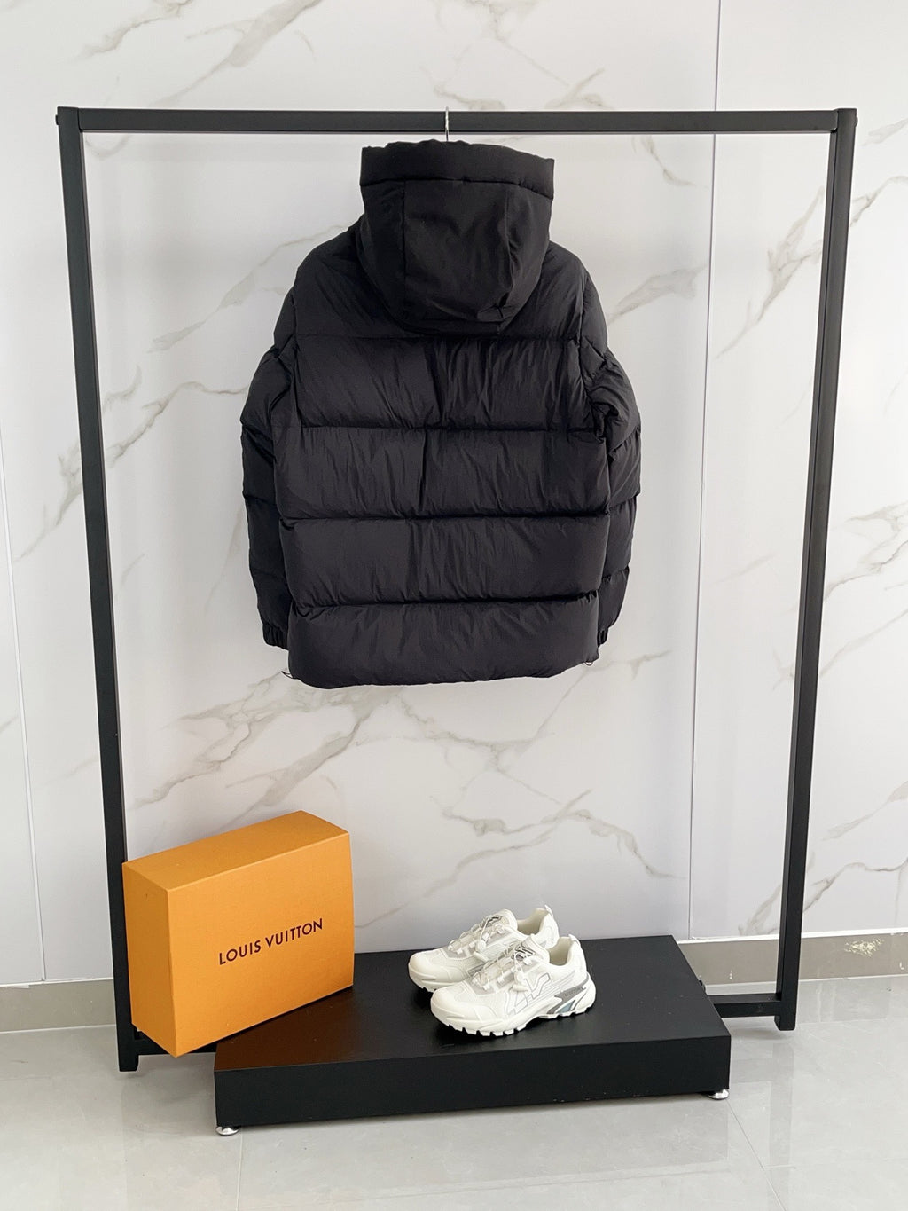 Moncler long hooded puffer jacket, black, back view, quilted padded insulation