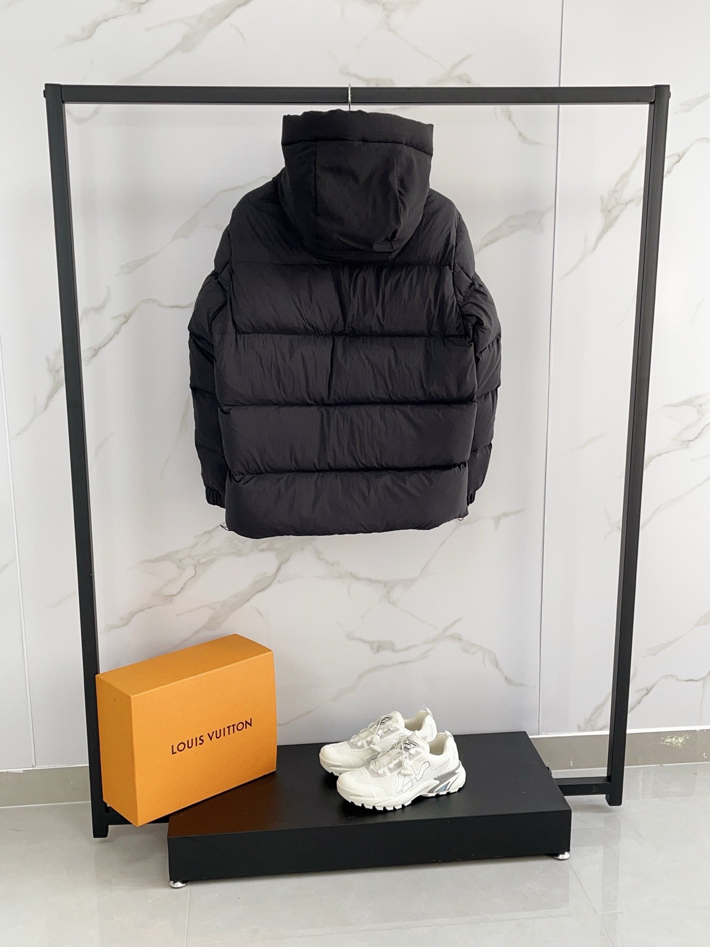 Moncler long hooded puffer jacket, black, back view, quilted padded insulation