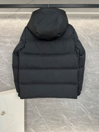Moncler long hooded puffer jacket, black, close-up back view with hood