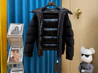 Moncler long hooded puffer jacket, dark, front detail with hanger tag