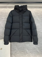 Moncler long hooded puffer jacket, black, close-up front with zipper and hood