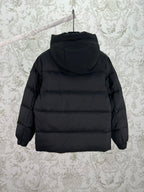 Moncler long hooded puffer jacket, black, back view with hood and front zipper