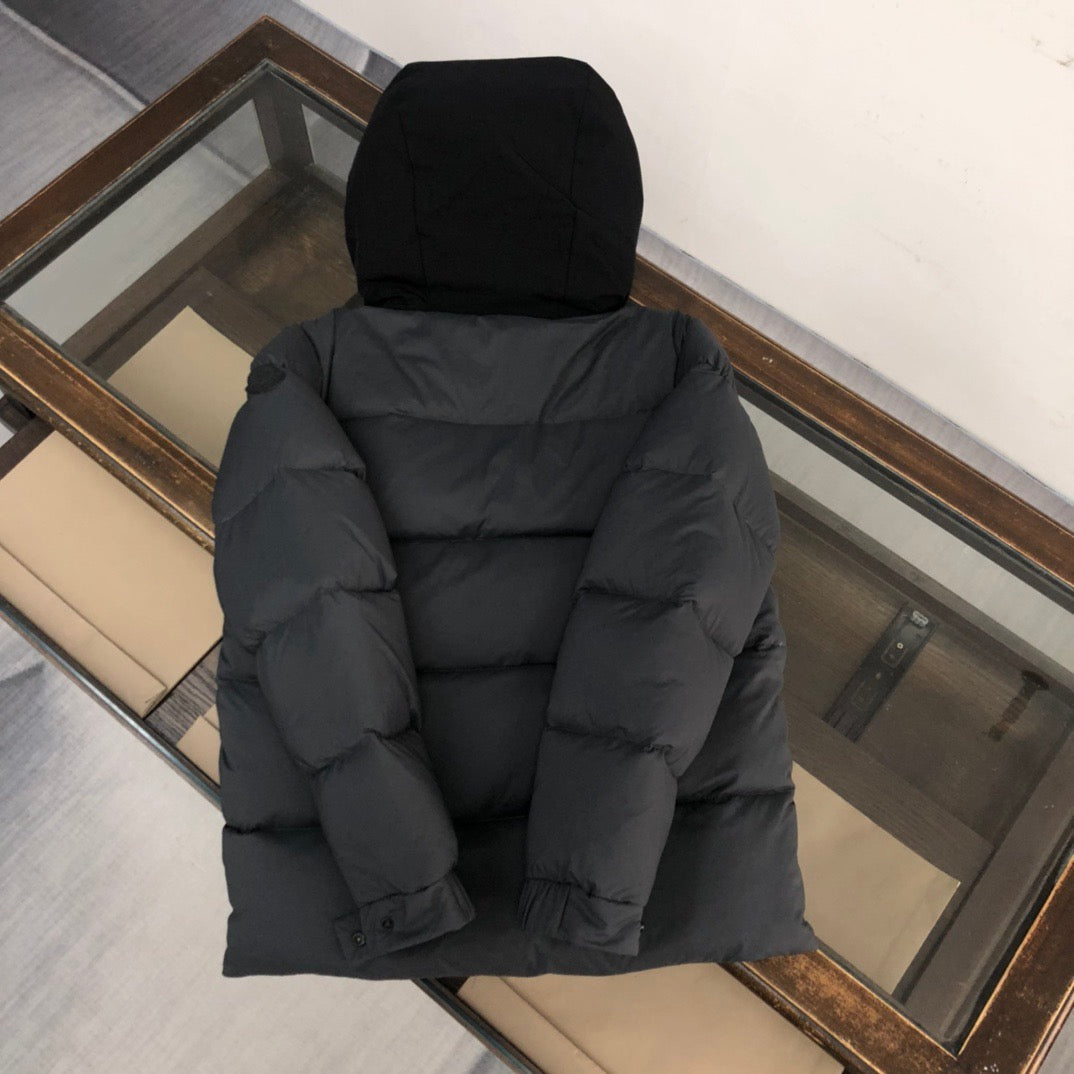 Moncler hooded puffer jacket, dark gray back view with hood and gathered seams