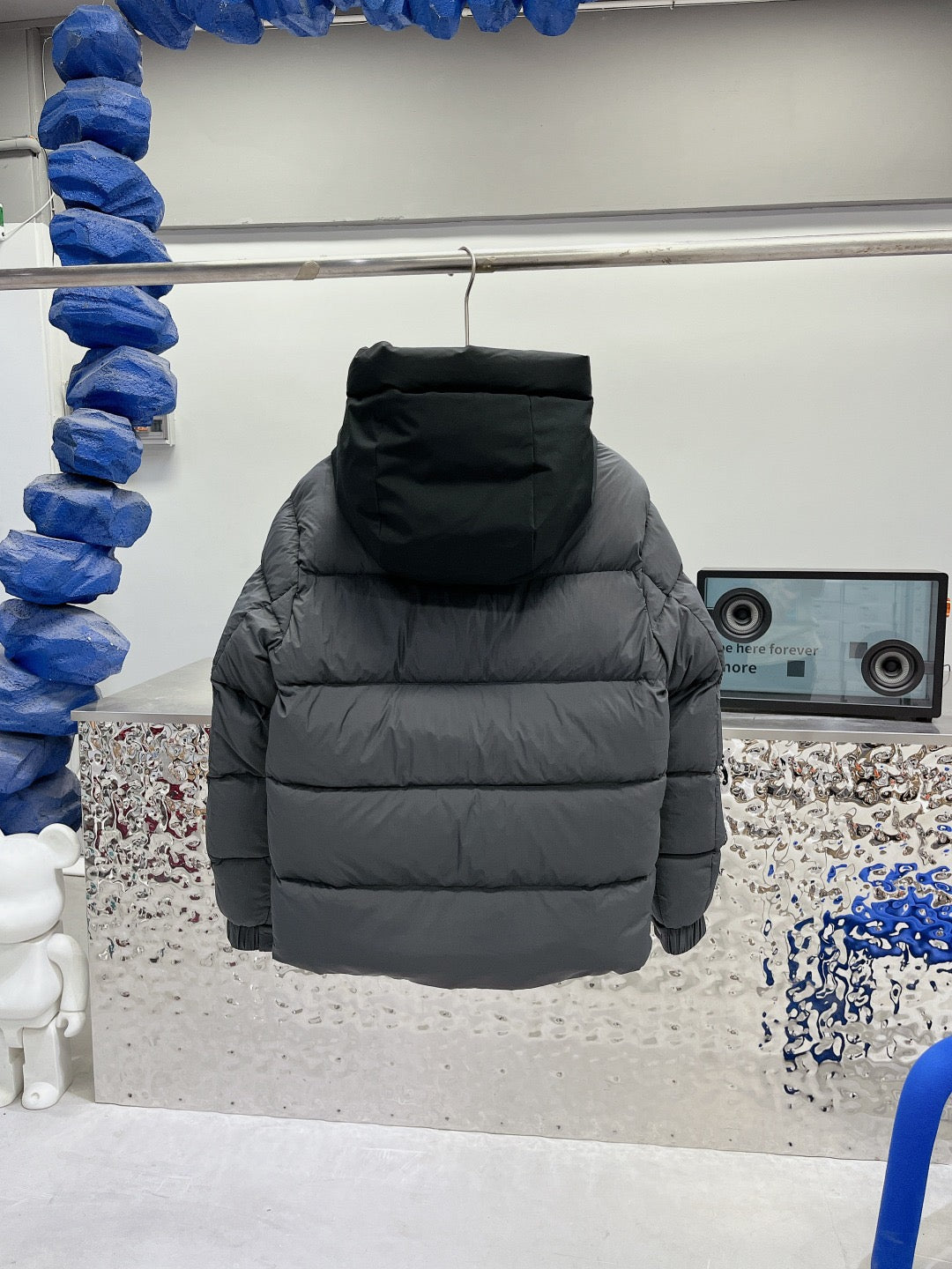 Moncler hooded puffer jacket, dark gray back view with full zipper
