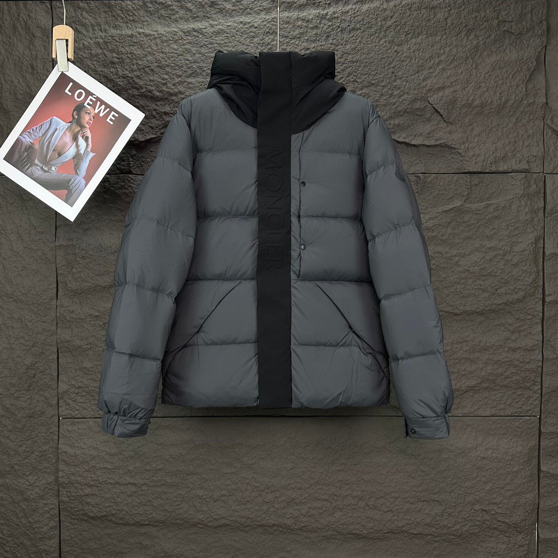 Moncler hooded puffer jacket, dark gray front view with central zipper