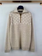 Long-sleeve zip sweater in light beige with repeating monogram pattern, stand collar