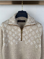 Half-zip sweater in light beige with allover monogram motifs and gold-tone zipper