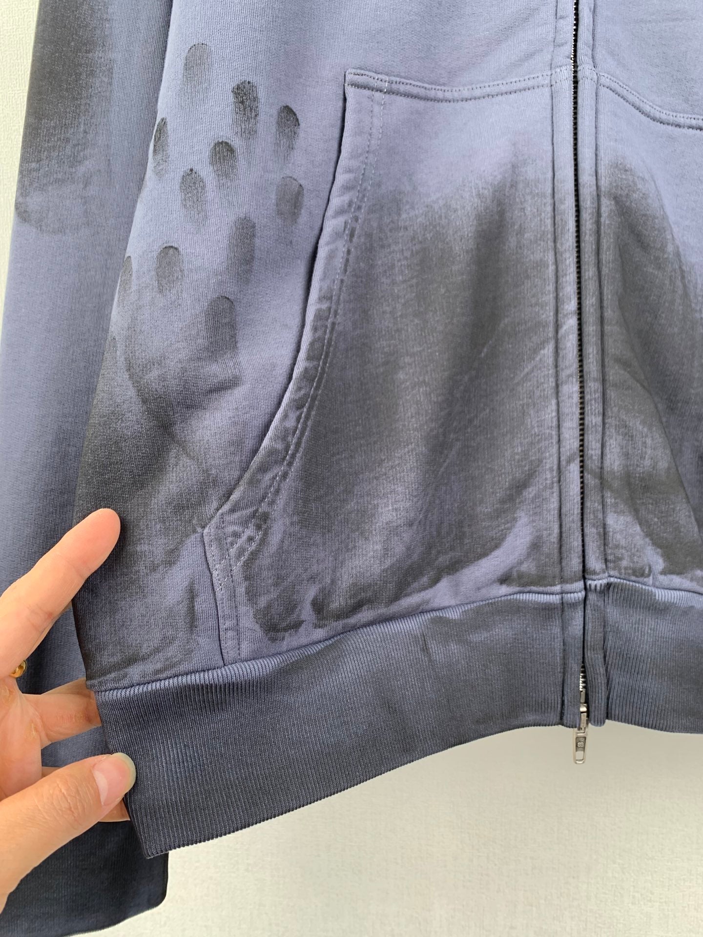 Dark blue Balenciaga zip-up hoodie front with paw-print graphic panel
