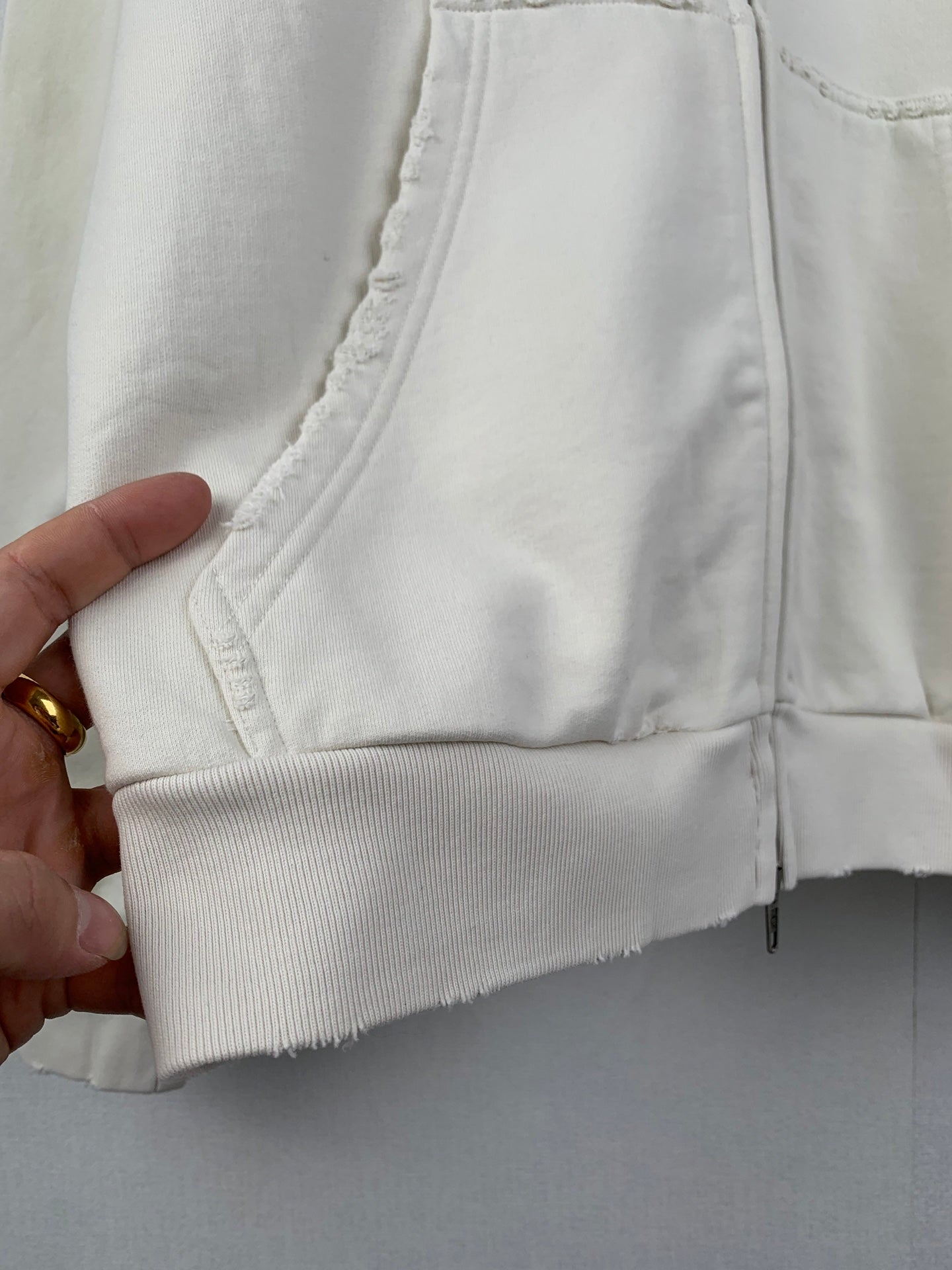 Balenciaga zip hoodie hem with ribbed cuff and stitched seam details