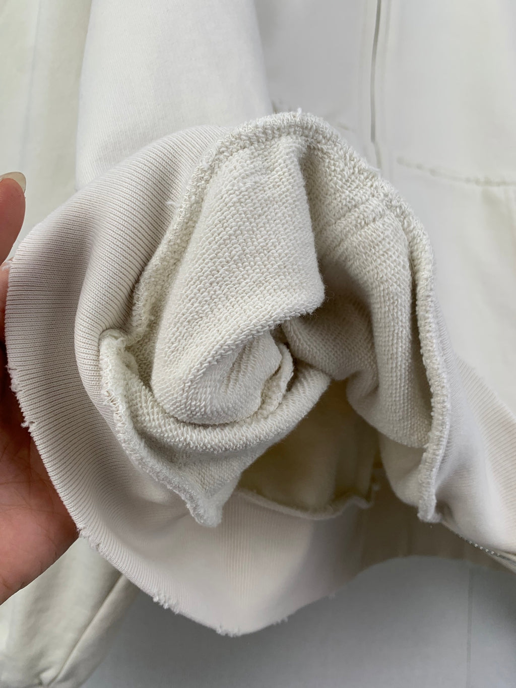 Balenciaga zip hoodie sleeve cuff with soft knit fabric texture