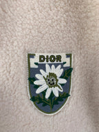 Ivory sherpa jacket crest patch with flower graphic