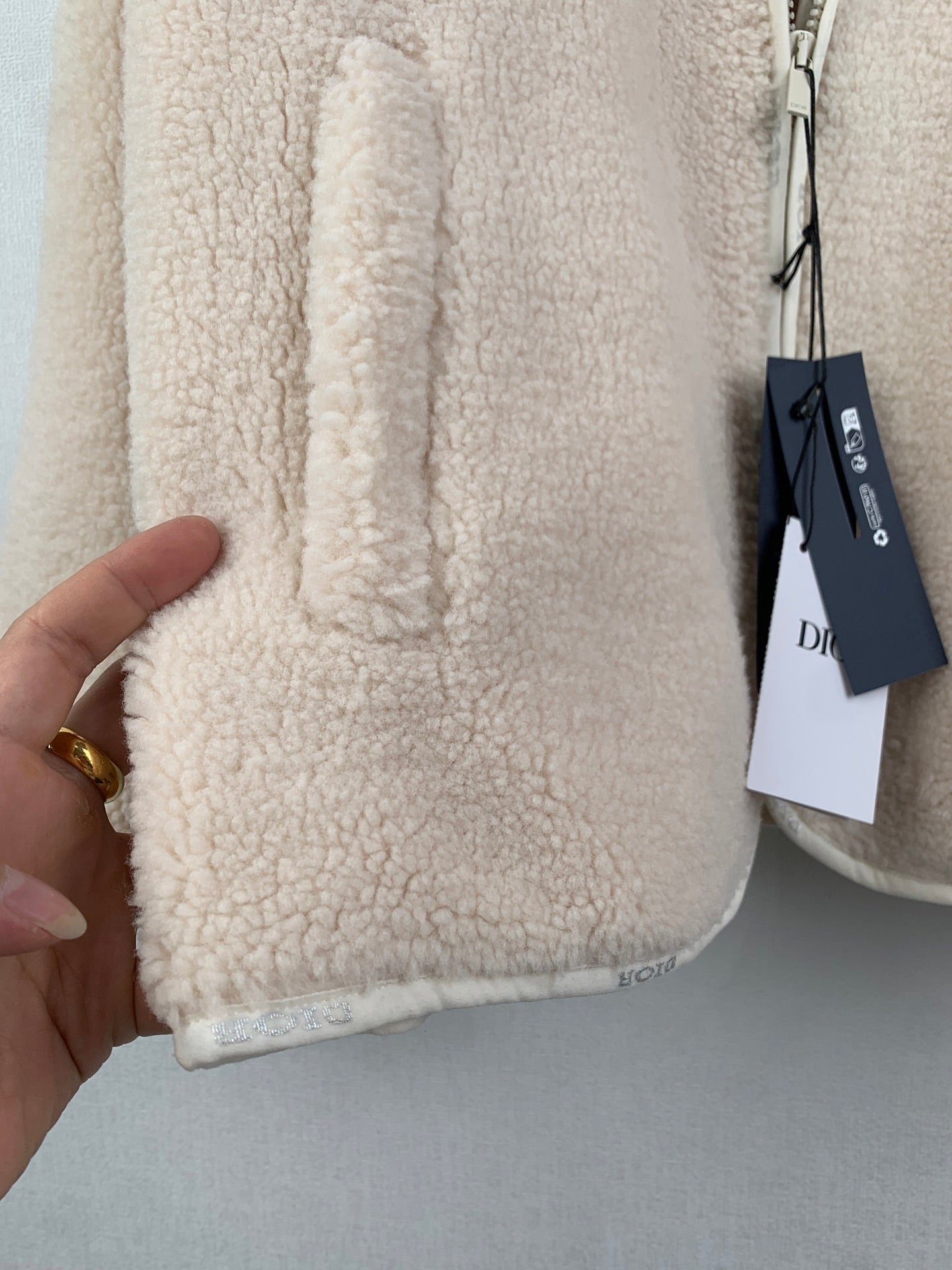 Cream sherpa long coat with side seam and partial hang tag