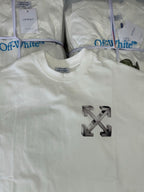 Off-white T-shirt with large metallic arrow X logo on front