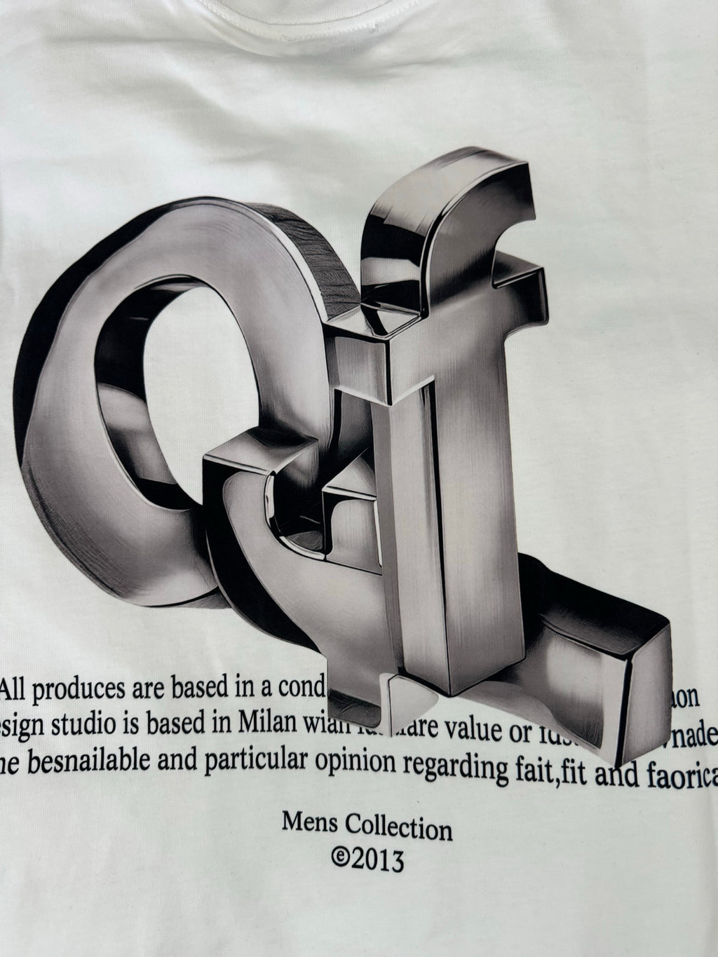 Off-white T-shirt close-up of metallic 3D logo with printed text below