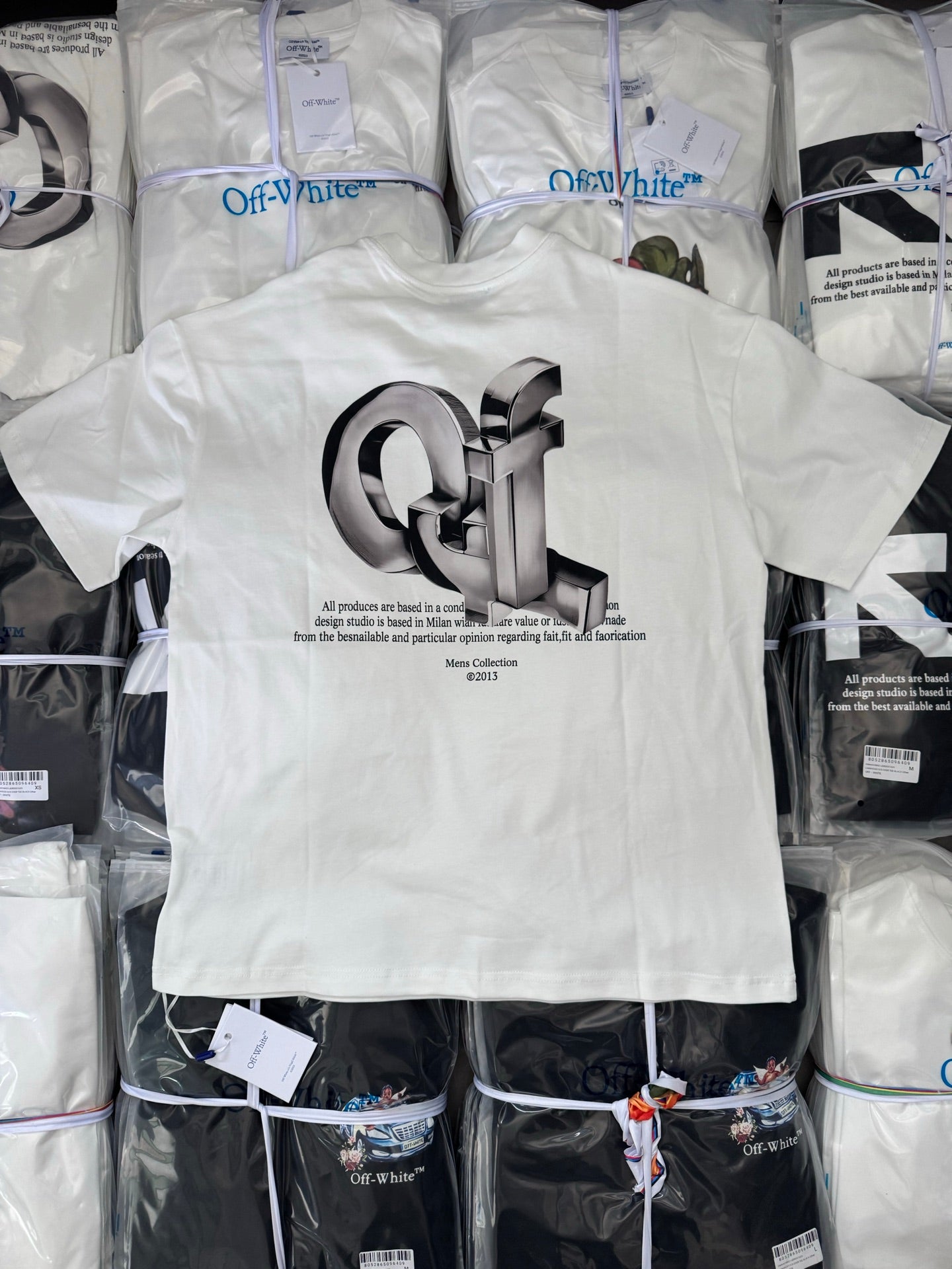 Off-white T-shirt with large metallic 3D logo and back text print