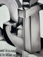 Metallic 3D logo print detail on off-white T-shirt