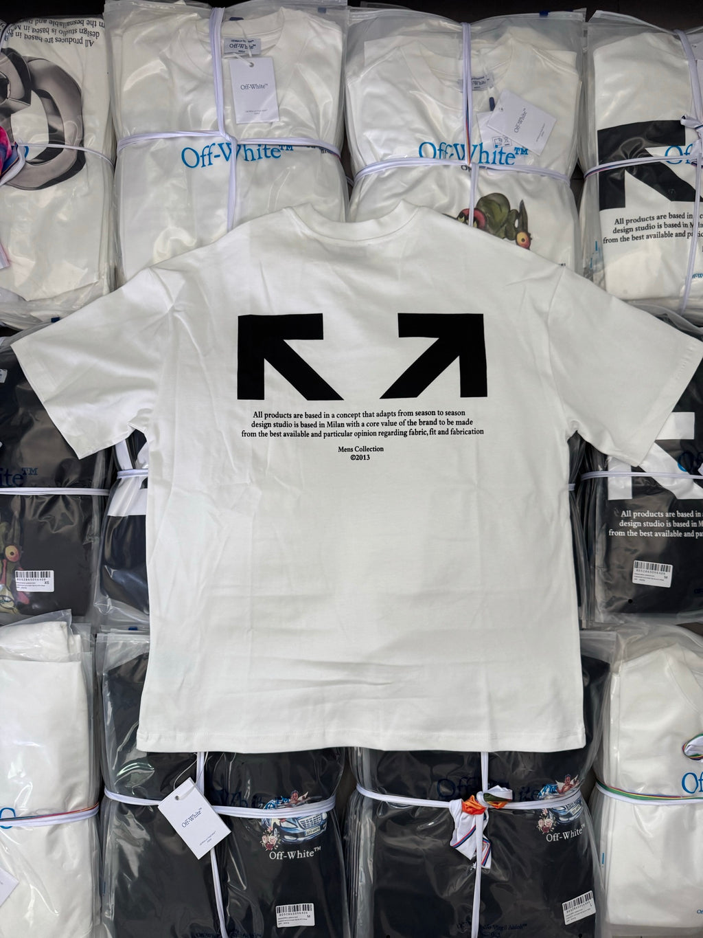 Off White T-shirt, white short-sleeve with large arrow graphic and slogan