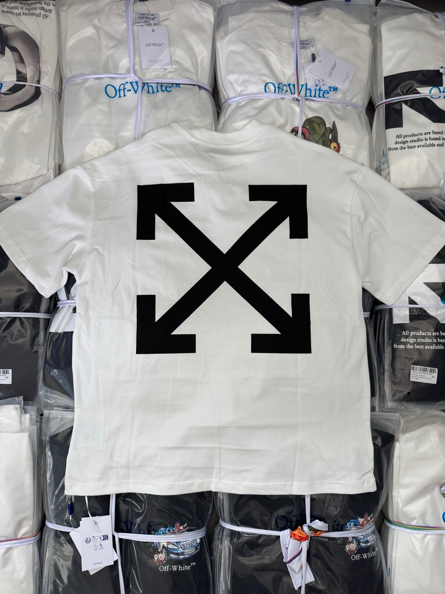 Off-white T-shirt back with large black arrow X graphic