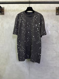 Black crewneck short-sleeve T-shirt with scattered white LV-style motif print