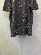 Black short-sleeve T-shirt with scattered white motif print, back view