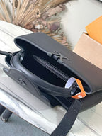 Dark structured handbag with open top and interior zip pocket