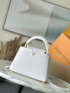 Louis Vuitton small leather handbag, white with LV front emblem and chain strap