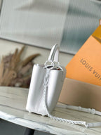 Louis Vuitton small leather handbag, white with top handle and shoulder chain strap