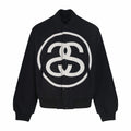 Black zip-up varsity jacket with large white double C logo