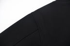 Black jacket sleeve with side seam and smooth knit cuff