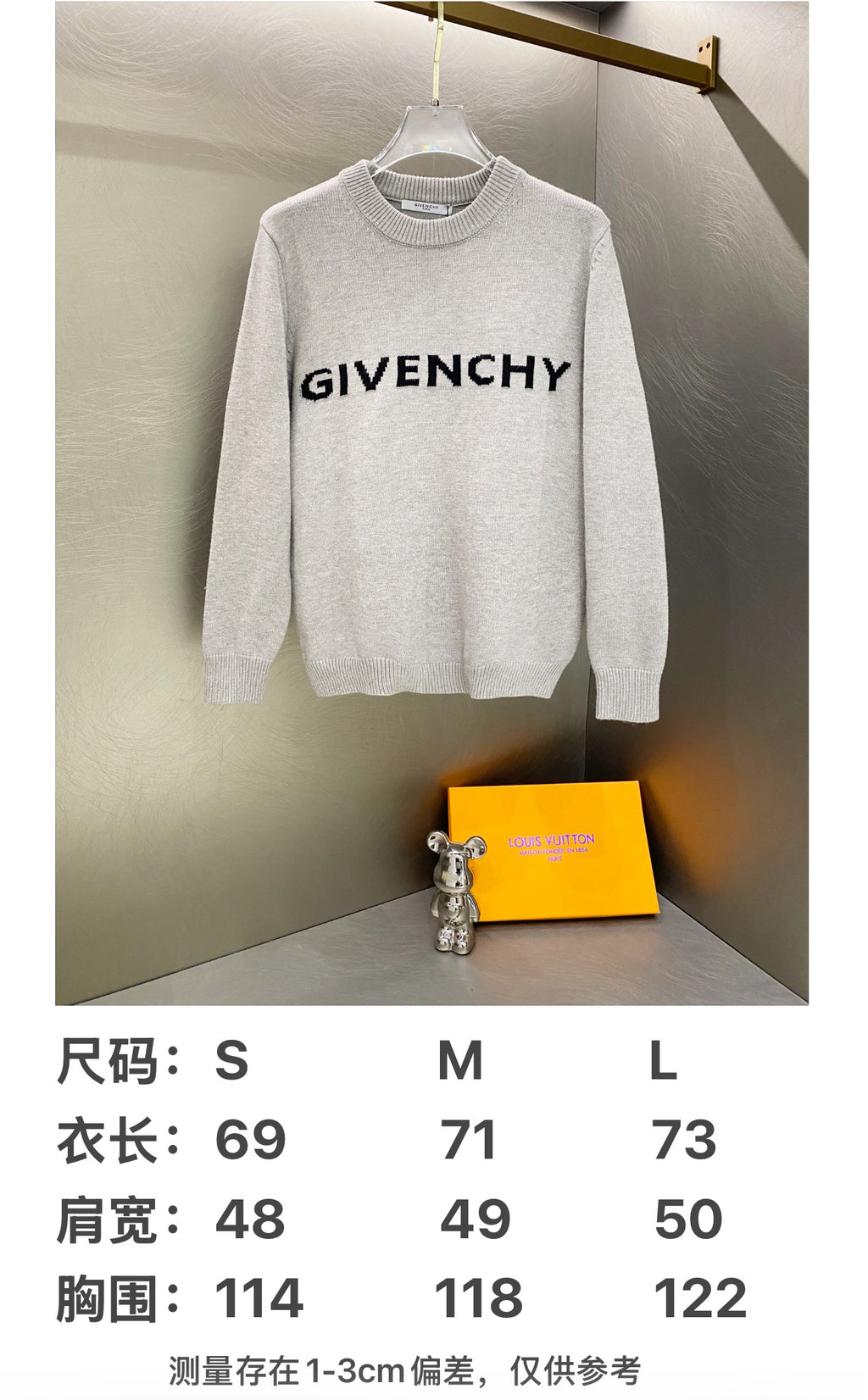 Givenchy white sweatshirt with bold black logo lettering on the chest