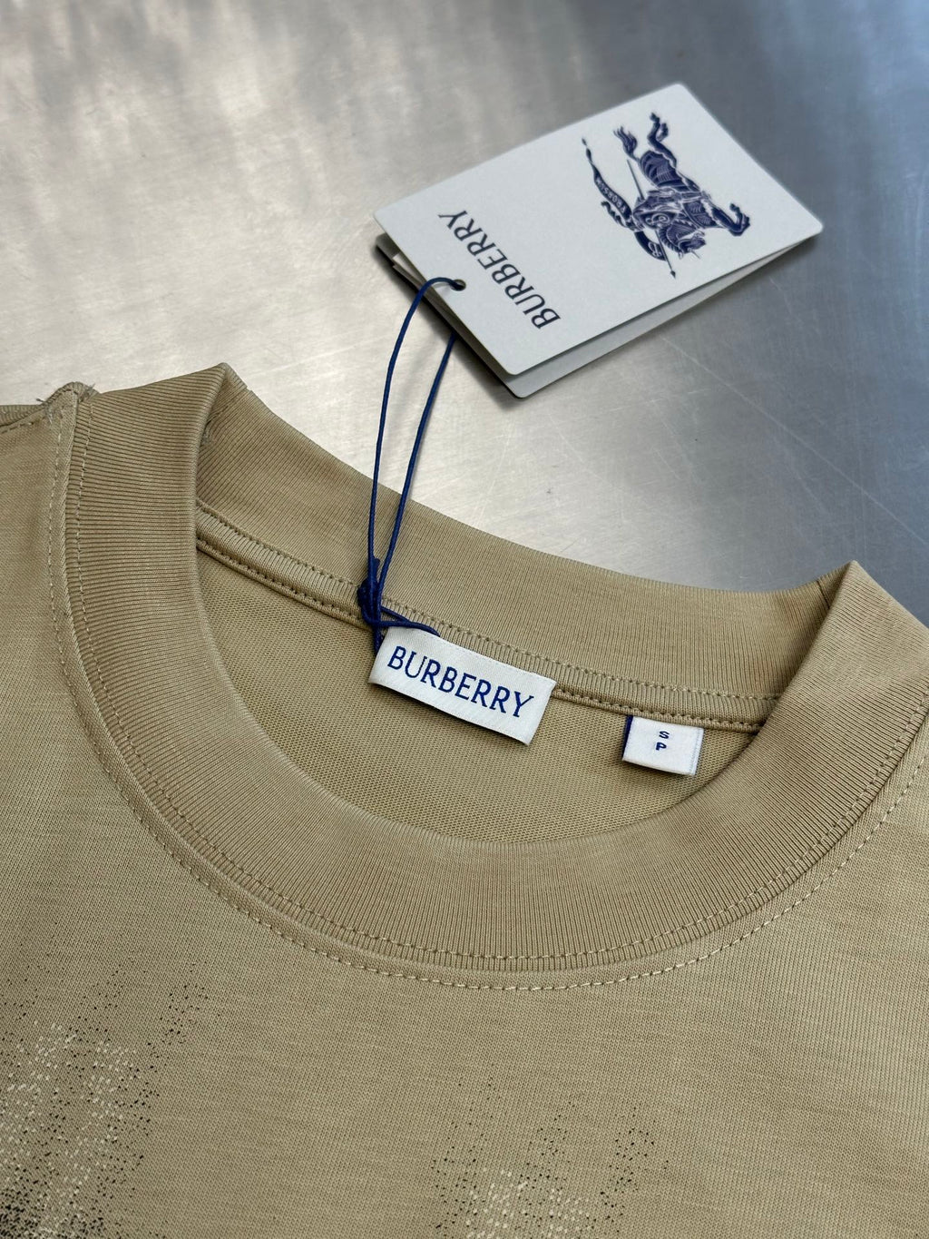 Beige crew-neck shirt with short sleeves and Burberry neck label