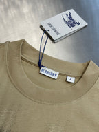 Beige crew-neck shirt with short sleeves and Burberry neck label
