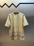 Beige short-sleeve shirt with crew neck and check plaid lower panel