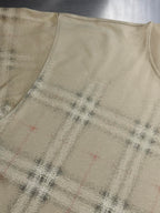 Beige shirt fabric with subtle check plaid pattern on lower body