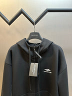 Black Balenciaga zip-up hoodie, hood with drawstring and chest logo