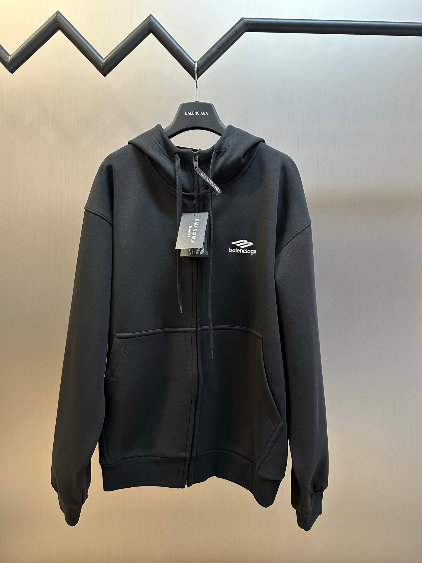 Black Balenciaga zip-up hoodie with hood and front zipper