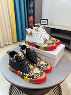 Versace high-top sneakers, black and gold baroque print with red and yellow sole accents