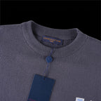 Louis Vuitton short-sleeve shirt collar with ribbed neckline, blue button, and inner label
