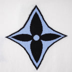 White T-shirt close-up of large blue four-point star logo