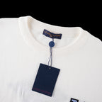 White Louis Vuitton T-shirt neckline with hang tag and ribbed collar