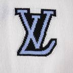 White T-shirt close-up of blue LV monogram embroidery