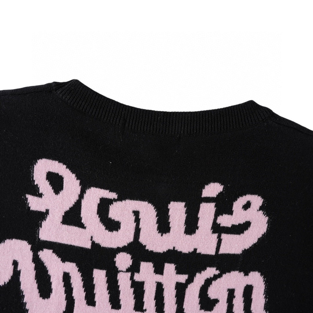 Louis Vuitton black T-shirt with large pink script graphic across the chest