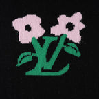 Louis Vuitton black T-shirt front graphic with two pink flowers and green leaves
