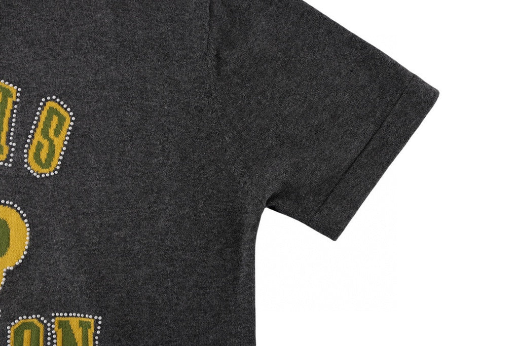 Dark gray T-shirt with partial rhinestone-style graphic on the side