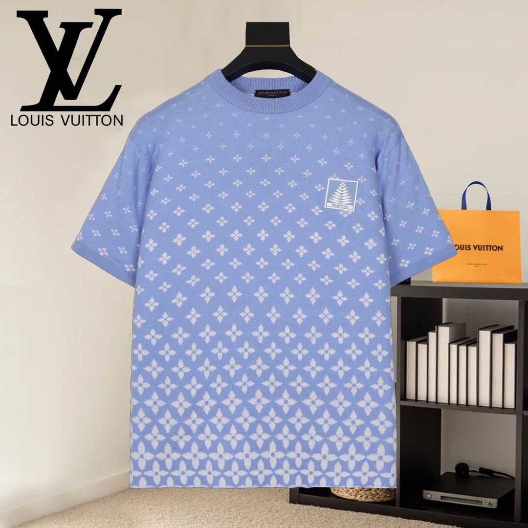 Louis Vuitton short-sleeve shirt in light blue with white repeating pattern and chest emblem