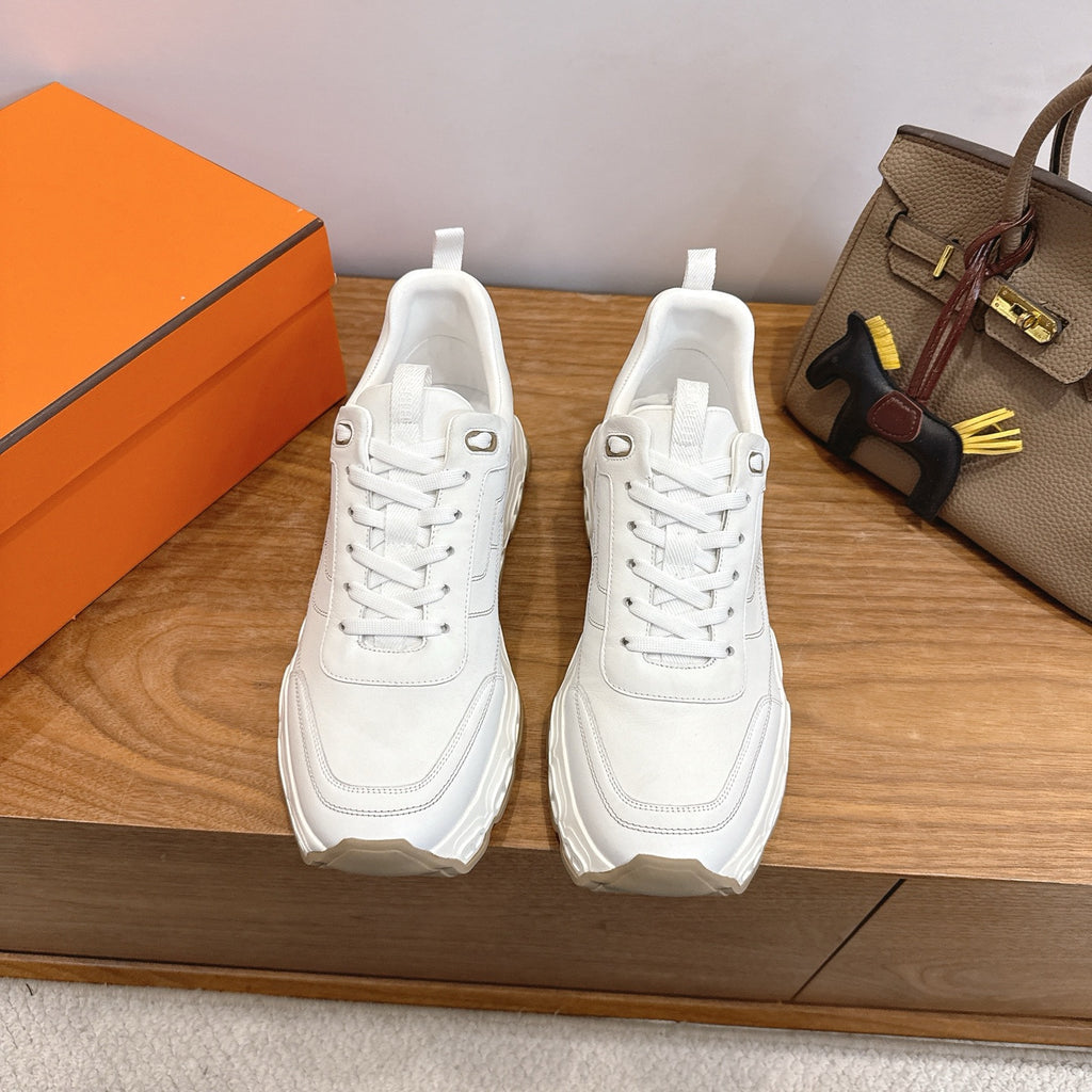 White lace-up sneakers with chunky sole, Hermes style