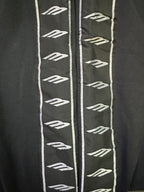 Black track pants with vertical contrast logo stripe on side