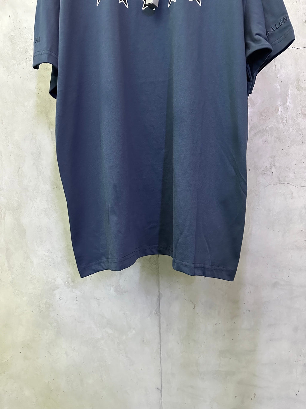 Balenciaga dark blue crewneck T-shirt with visible hem and short sleeves
